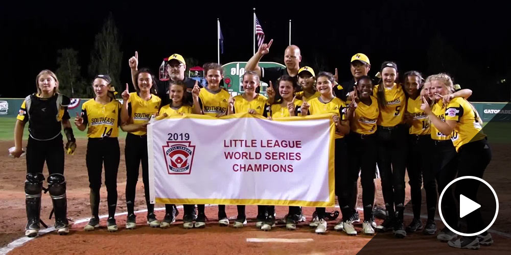 southeast team holding banner